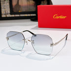 Gold-tone metal glasses with light blue lenses, hexagonal frames and metal temples