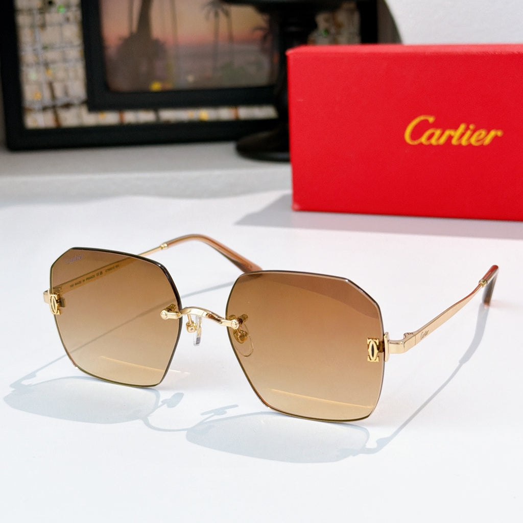 Gold-tone metal glasses with amber lenses, hexagonal frames and metal temples