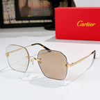 Gold-tone metal glasses with clear lenses, hexagonal frames and metal temples