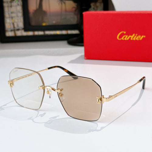 Gold-tone metal glasses with clear lenses, hexagonal frames and metal temples