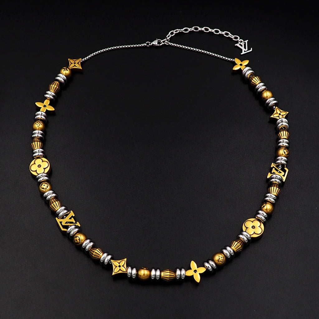 Louis Vuitton beaded chain necklace with gold and silver flower and LV charms