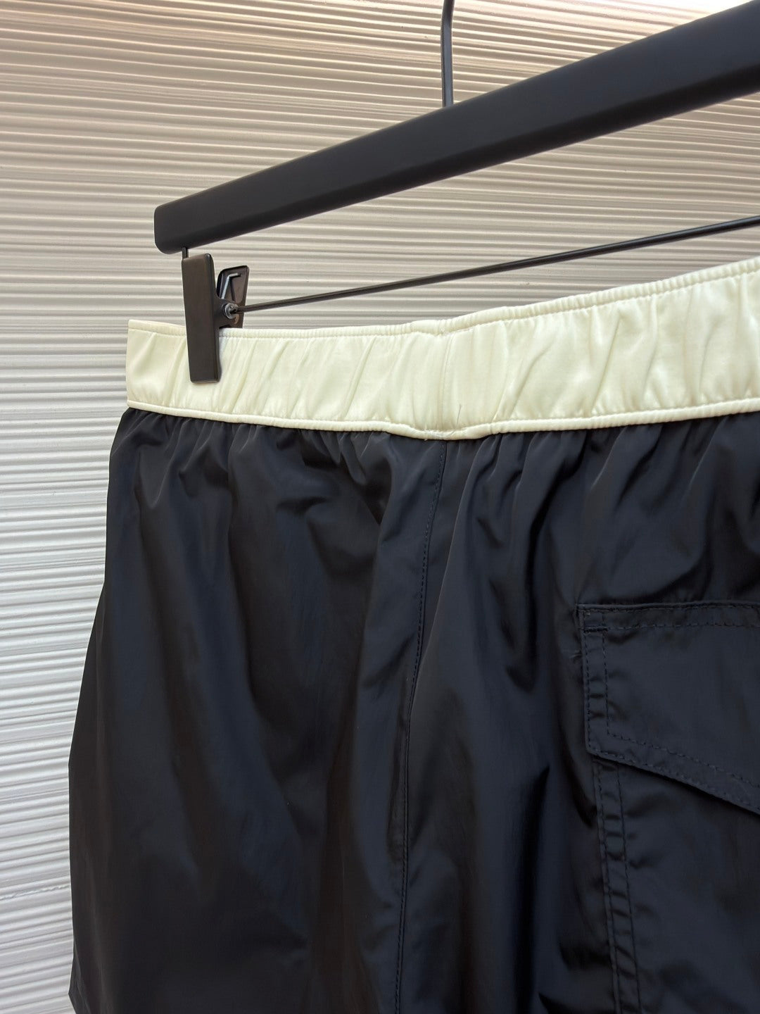 Moncler dark navy swim shorts with pale waistband and back pocket detail