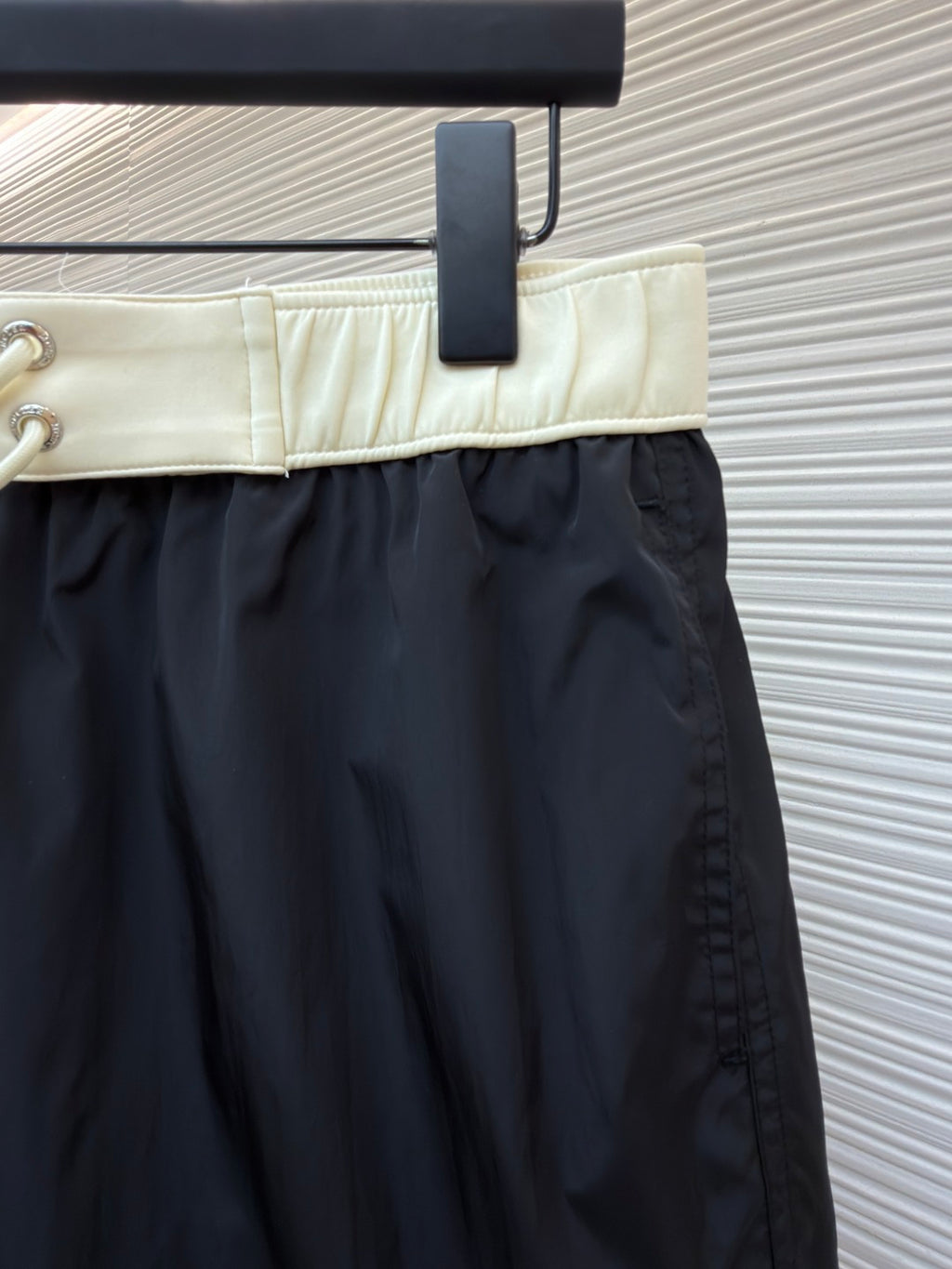 Moncler dark navy swim shorts with pale elastic waistband and stitched front panel