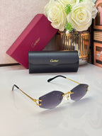 Gold metal sunglasses with purple lenses and black temple tips, angled view