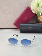 Gold metal sunglasses with blue-tinted lenses and black temple tips