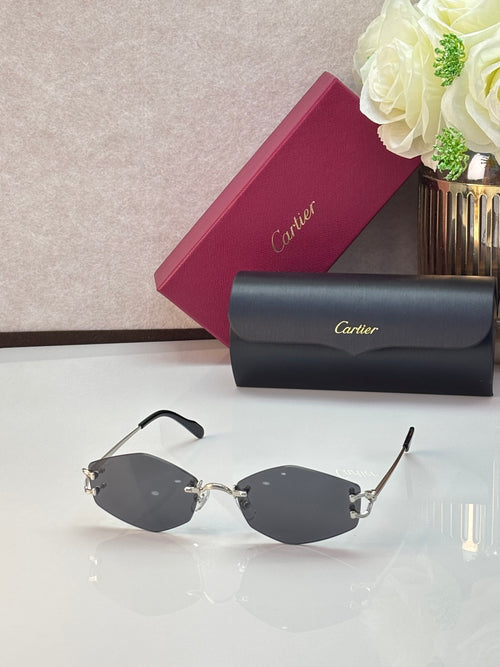 Gold metal sunglasses with dark lenses and black temple tips, front view