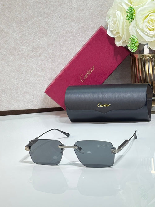 Cartier sunglasses with dark gray lenses, metal frame, and gray case