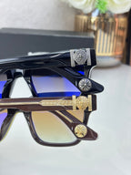Chrome glasses with decorative temple accents and colorful lenses, close-up