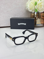 Black oval glasses with clear lenses, shown at a side angle
