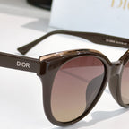 Dior cat-eye sunglasses side view with dark frames and rose-brown tinted lenses