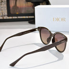 Dior cat-eye sunglasses angled view with dark frames and brown tinted lenses