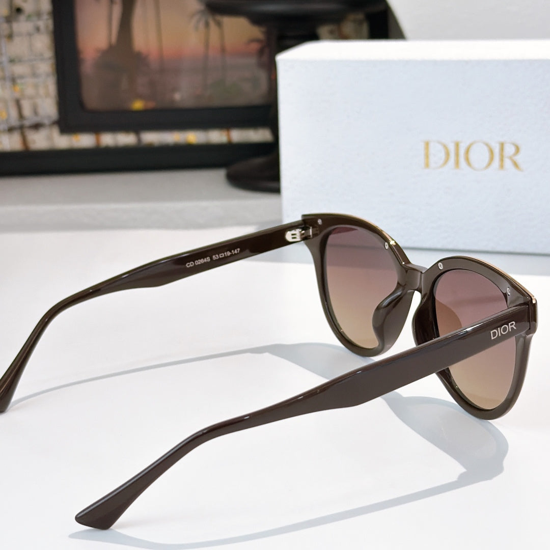 Dior cat-eye sunglasses angled view with dark frames and brown tinted lenses