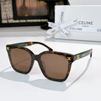Sunglasses with tortoiseshell frame and brown tinted lenses, gold logo on temples