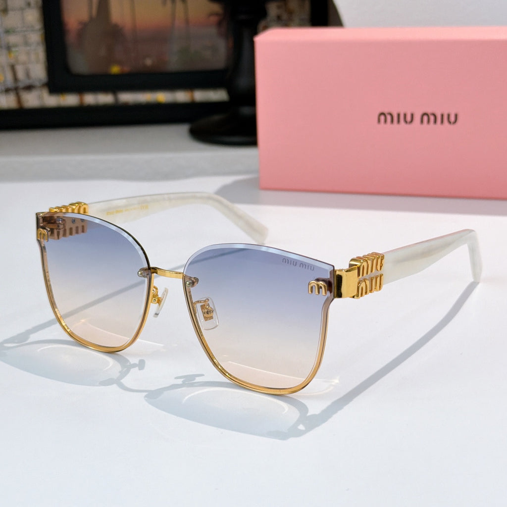 MiuMiu glasses with gold round frames and light blue gradient lenses