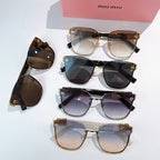 Assorted MiuMiu glasses with mixed frames and tinted lenses