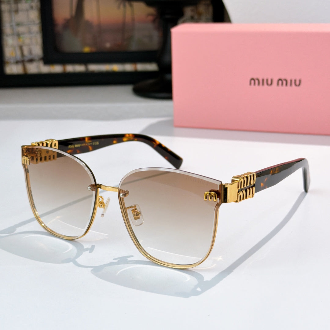 MiuMiu glasses with gold round frames and tortoiseshell arms