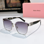 MiuMiu glasses with silver cat-eye frames and purple-tinted lenses