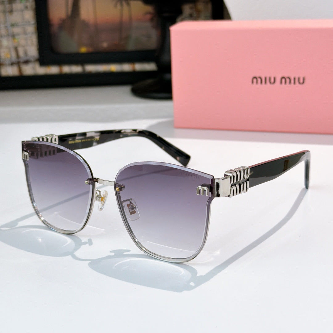 MiuMiu glasses with silver cat-eye frames and purple-tinted lenses