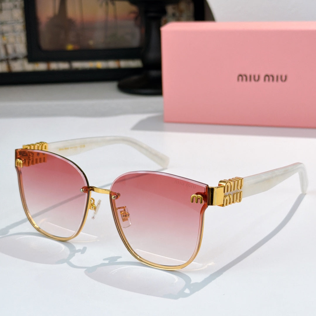 MiuMiu glasses with gold round frames and pink gradient lenses