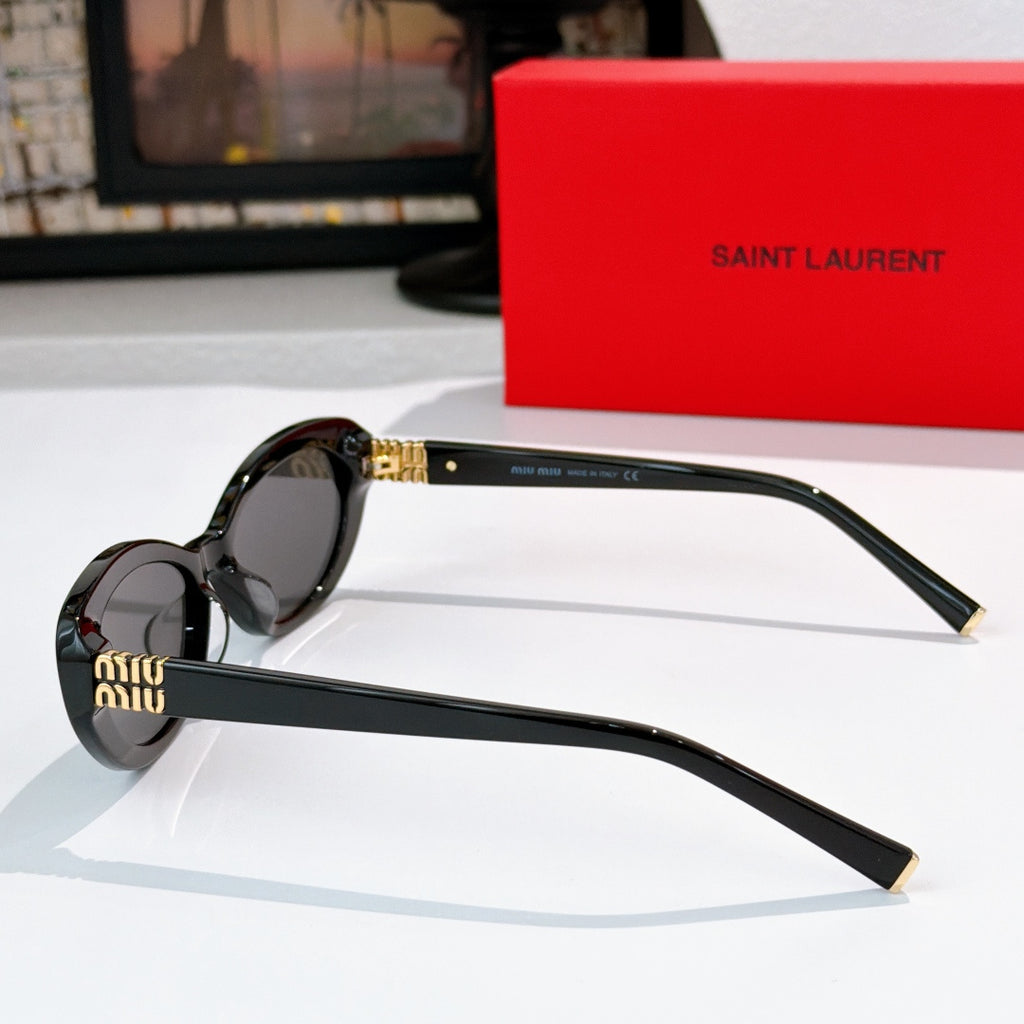 MiuMiu cat-eye sunglasses side view, dark lenses with glossy frame and gold logo detail