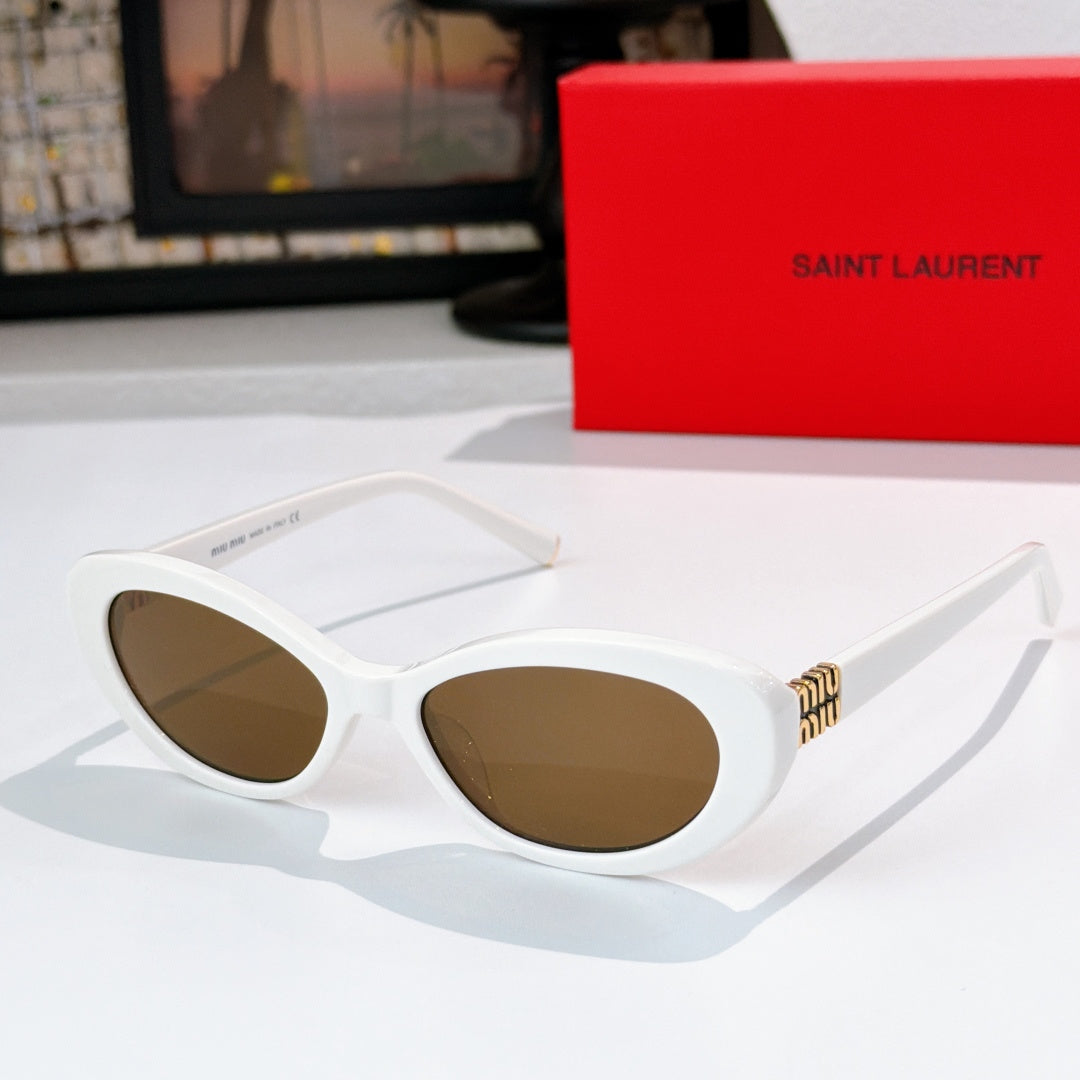 MiuMiu cat-eye sunglasses with white frame and brown lenses, gold logo detail