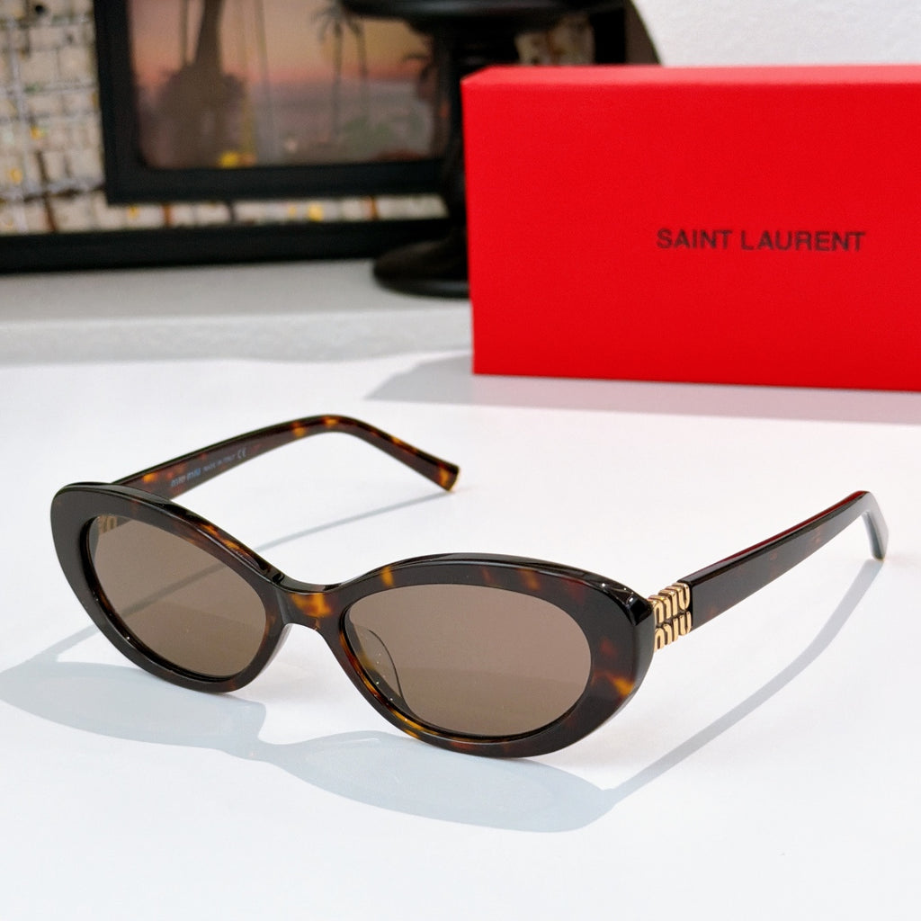 MiuMiu cat-eye sunglasses with tortoiseshell frame and brown lenses, gold logo detail