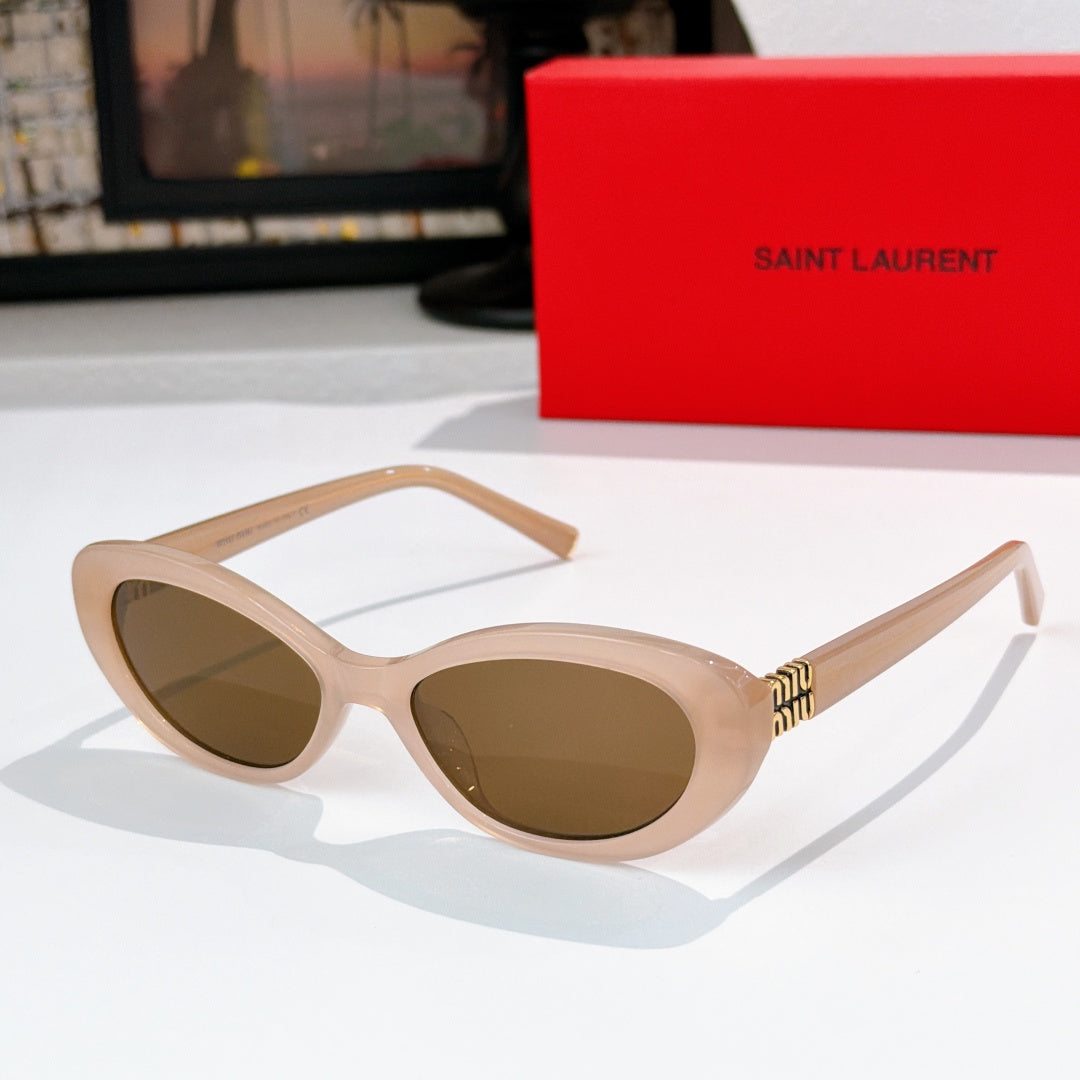 MiuMiu cat-eye sunglasses with light beige frame and brown lenses, gold logo detail