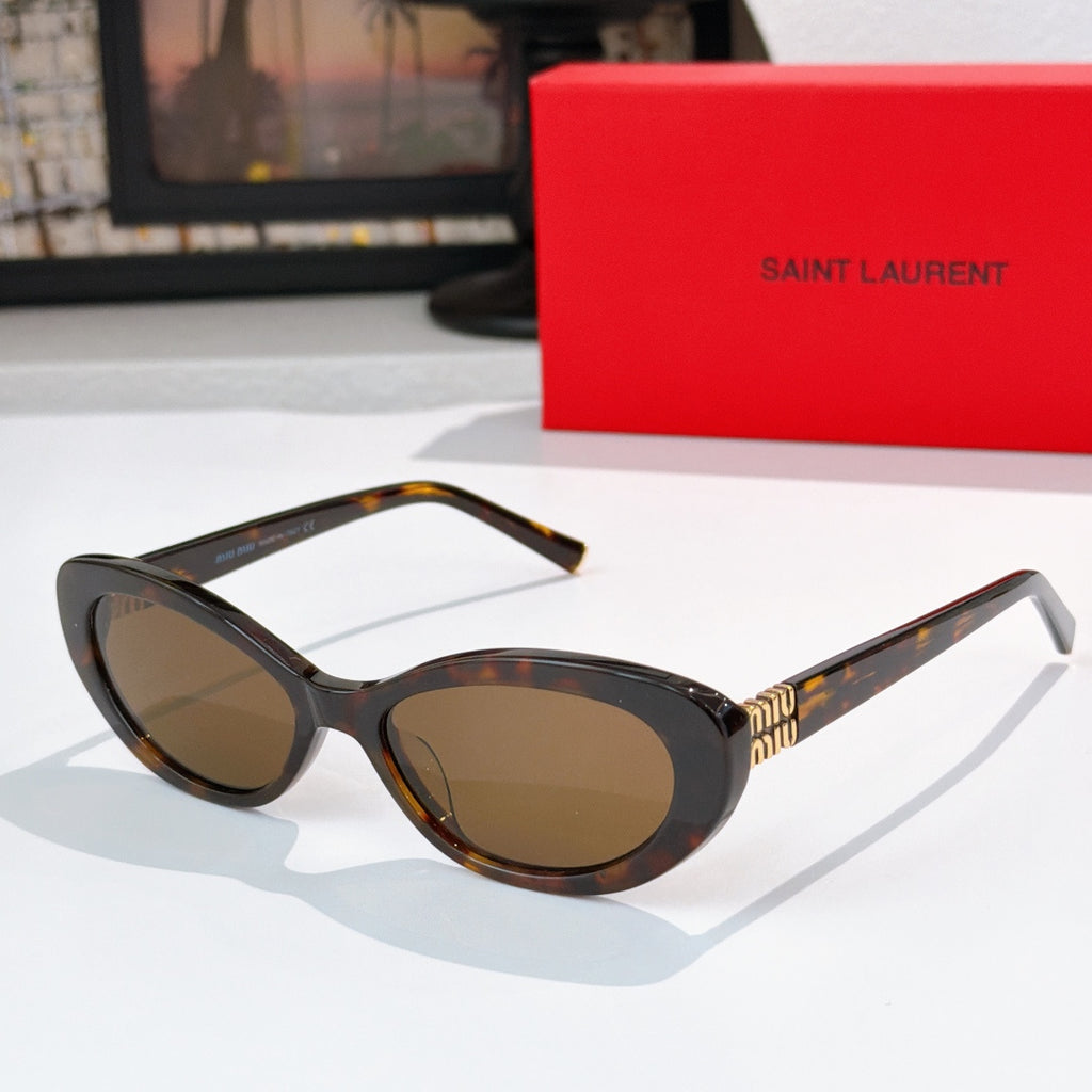 MiuMiu cat-eye sunglasses with tortoiseshell frame and brown lenses, gold logo detail