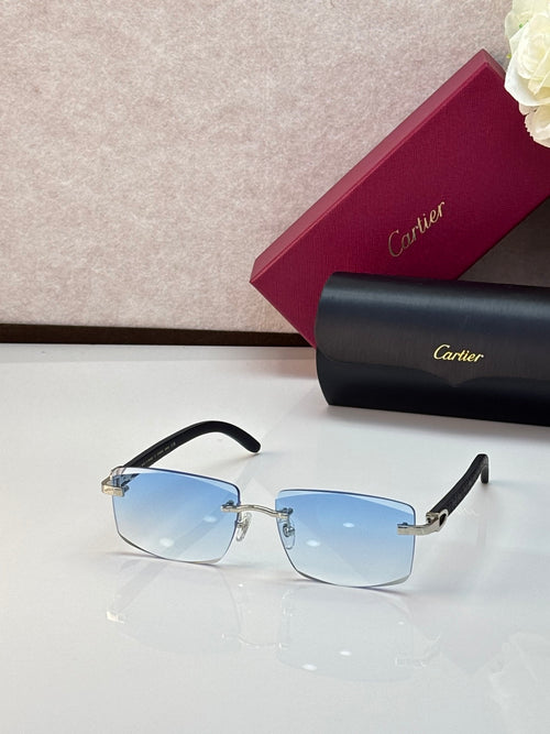 Cartier eyeglasses with black rectangular frames and light-blue gradient lenses, gold accents