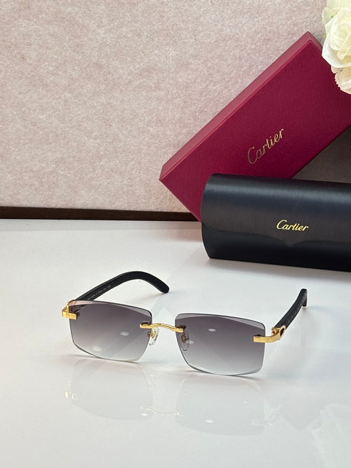 Cartier eyeglasses with black rectangular frames and dark gradient lenses, gold accents