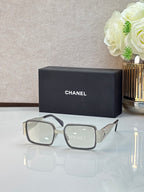 Celine glasses with light gray frames and clear lenses