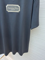 Dior dark blue T-shirt with Christian Dior Couture logo patch and curved hemline
