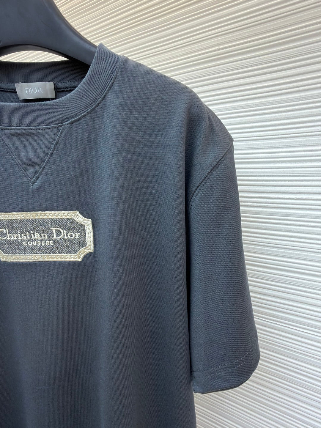 Dior short-sleeve T-shirt with dark blue fabric and Christian Dior label patch