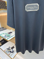 Dior dark blue T-shirt with Christian Dior Couture logo patch and curved hem