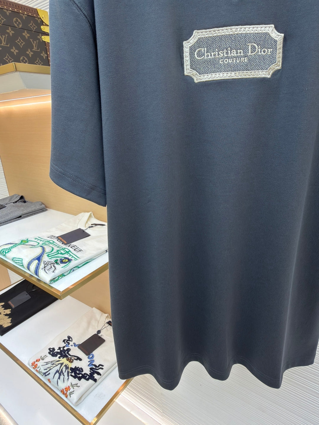 Dior dark blue T-shirt with Christian Dior Couture logo patch and curved hem