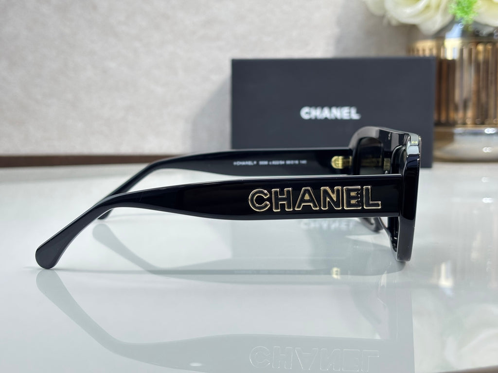 Chanel glasses with black frame and engraved CHANEL temple, side view