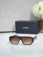 Chanel glasses with tortoiseshell frames and brown tinted lenses, front view