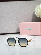 Square sunglasses with dark frame and tinted lenses, gold-toned temple detail