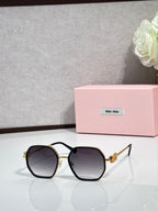 Square sunglasses with black frame, dark tinted lenses, gold-toned temple hardware