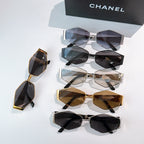 Sunglasses set with mixed frames and dark tinted lenses on a white display