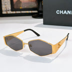 Gold-tone hexagon sunglasses with dark lenses and slim metal temples