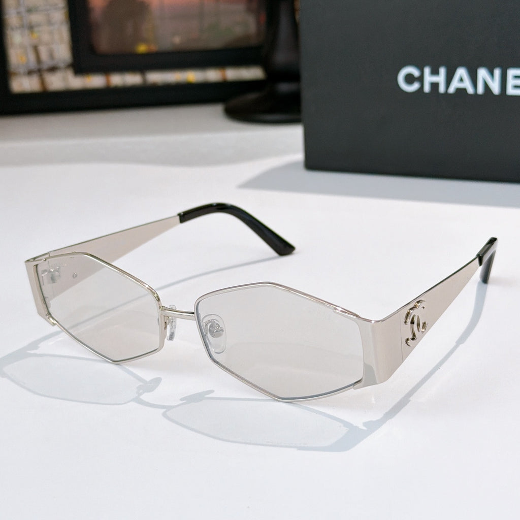 Hexagon sunglasses with clear-silver frames and dark lenses, detailed temples