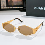 Gold-tone hexagon sunglasses with amber lenses and black temple accents