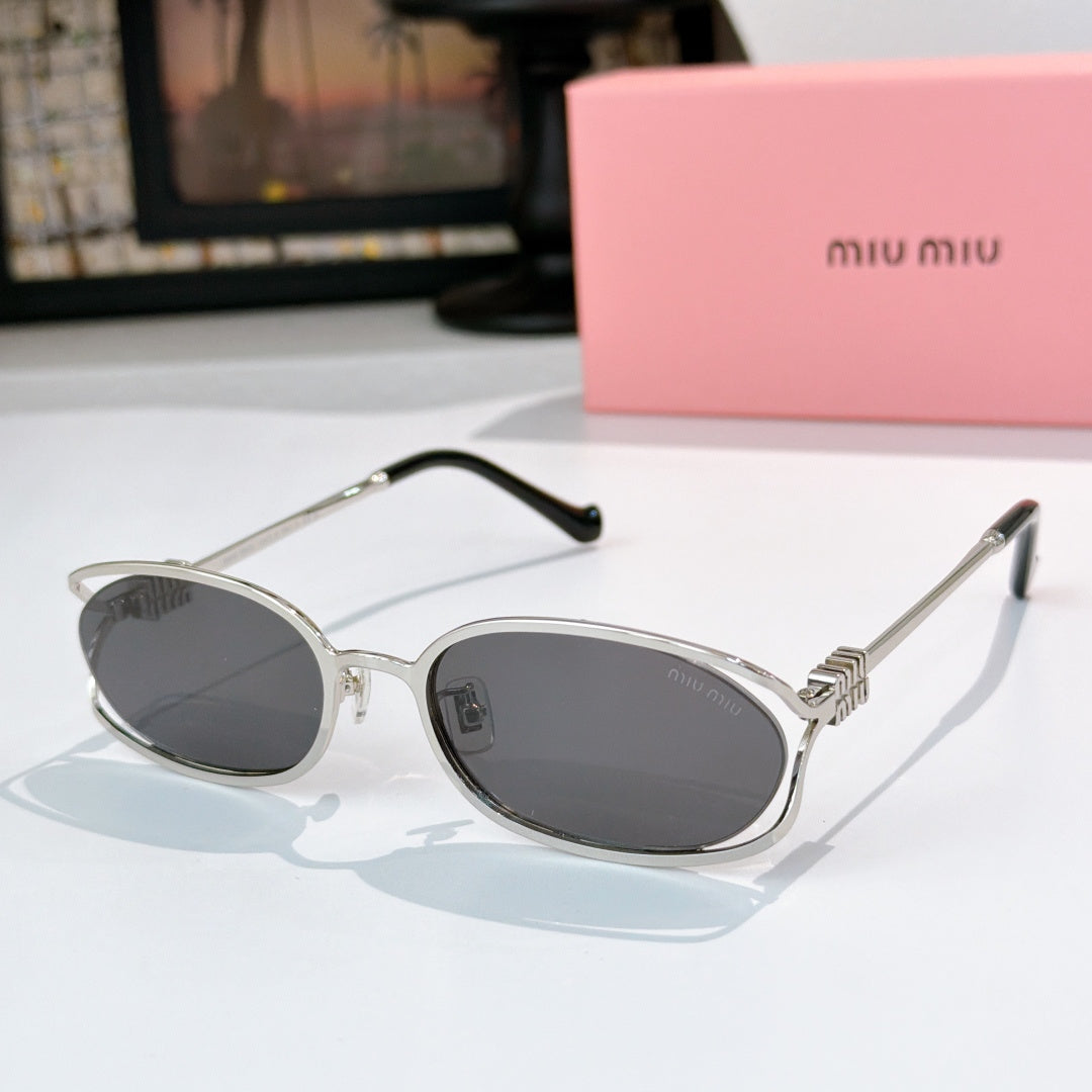 MiuMiu sunglasses with silver-tone oval frames and dark lenses, black temple arms