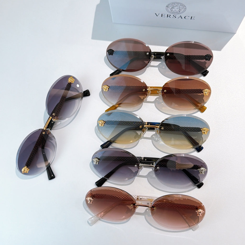 Multiple round sunglasses with dark and brown lenses, gold frames, and textured arms