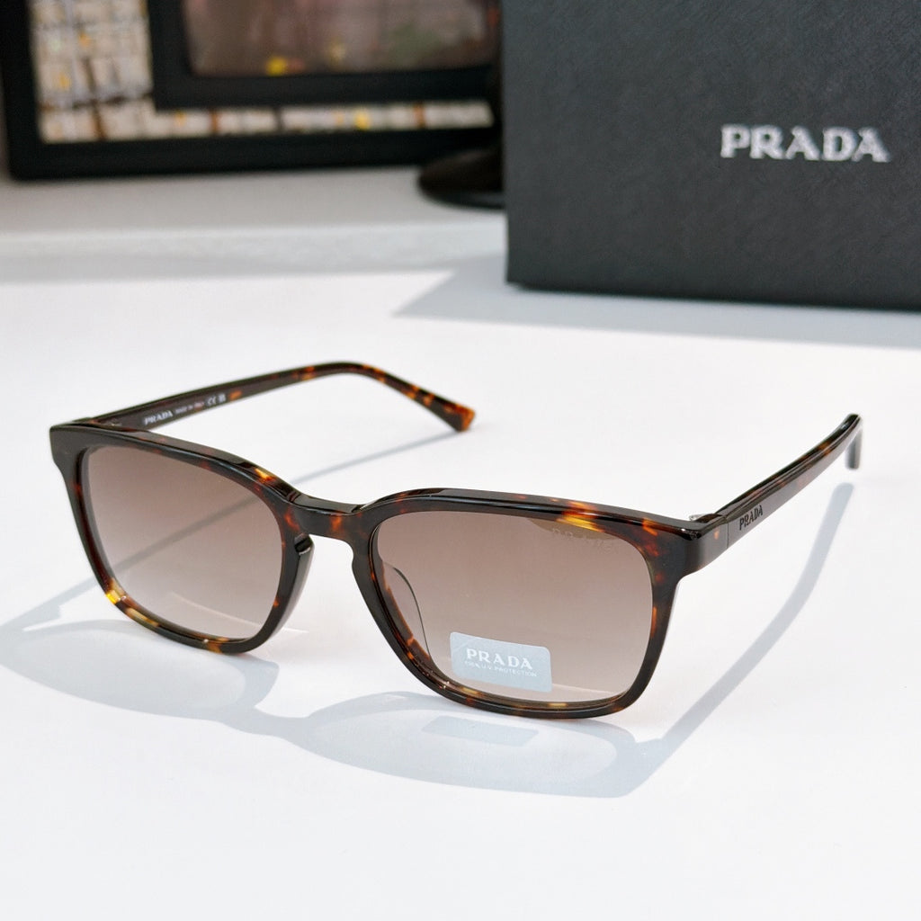Prada sunglasses with tortoiseshell frame and brown-tinted lenses