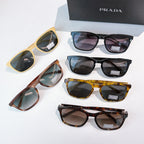 Assorted Prada sunglasses with different frames and tinted lenses