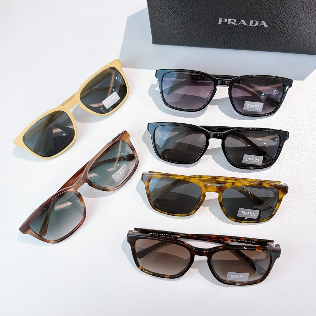 Assorted Prada sunglasses with different frames and tinted lenses