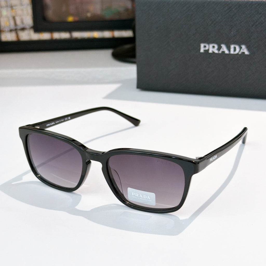 Prada sunglasses with black frame and purple-tinted lenses