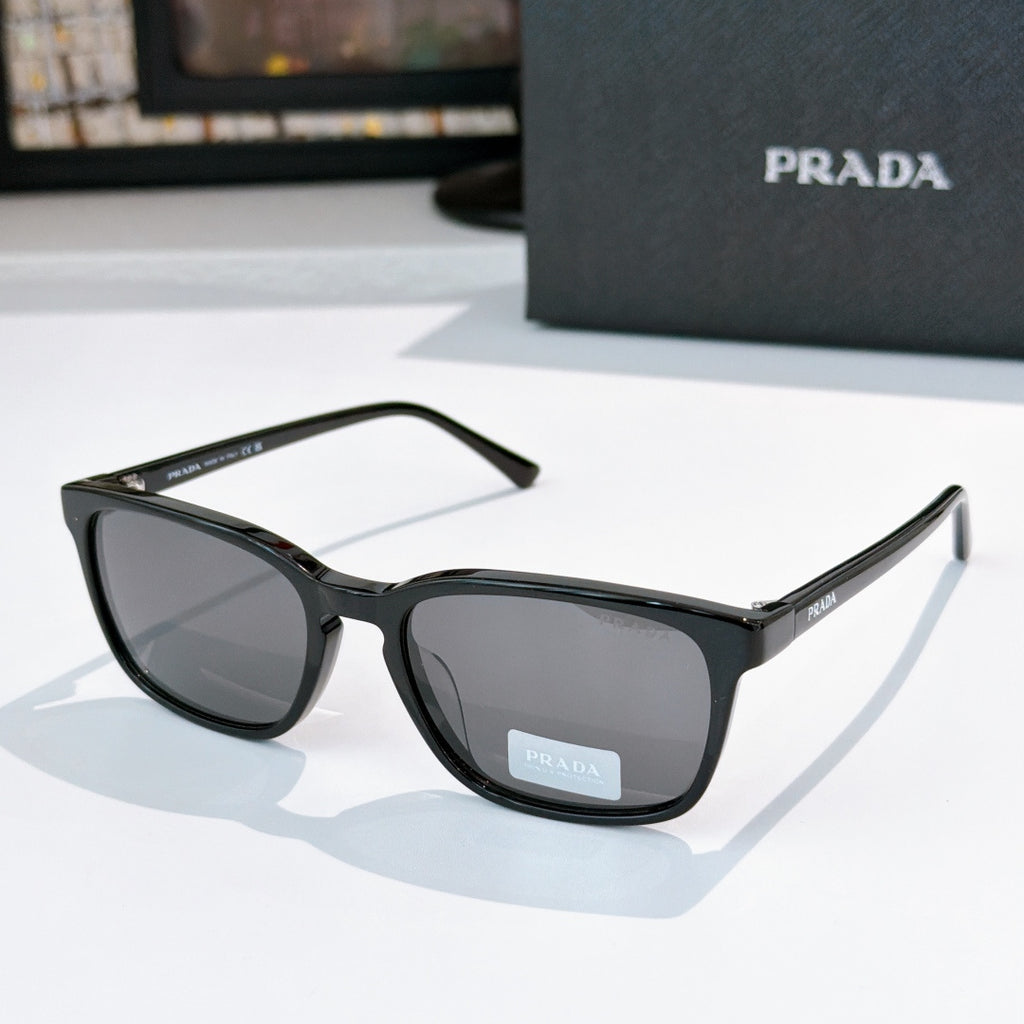 Prada sunglasses with black frame and dark gray lenses